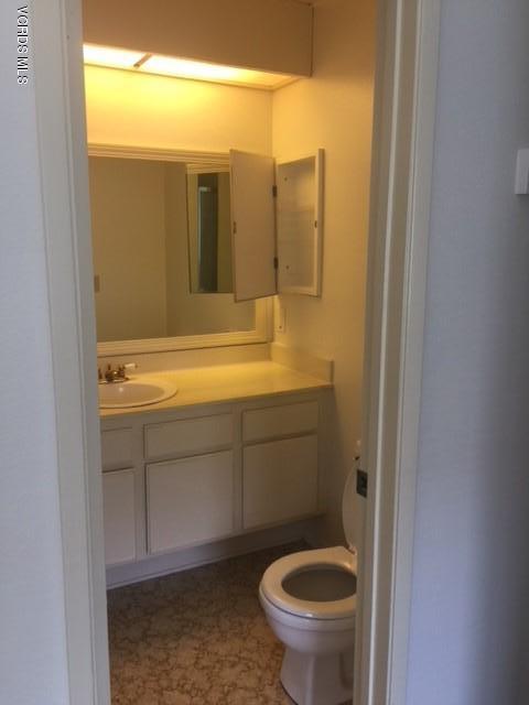 312 East Bard Road Oxnard, CA 93033 - Photo 17 of 20 a bathroom with a sink and a toilet