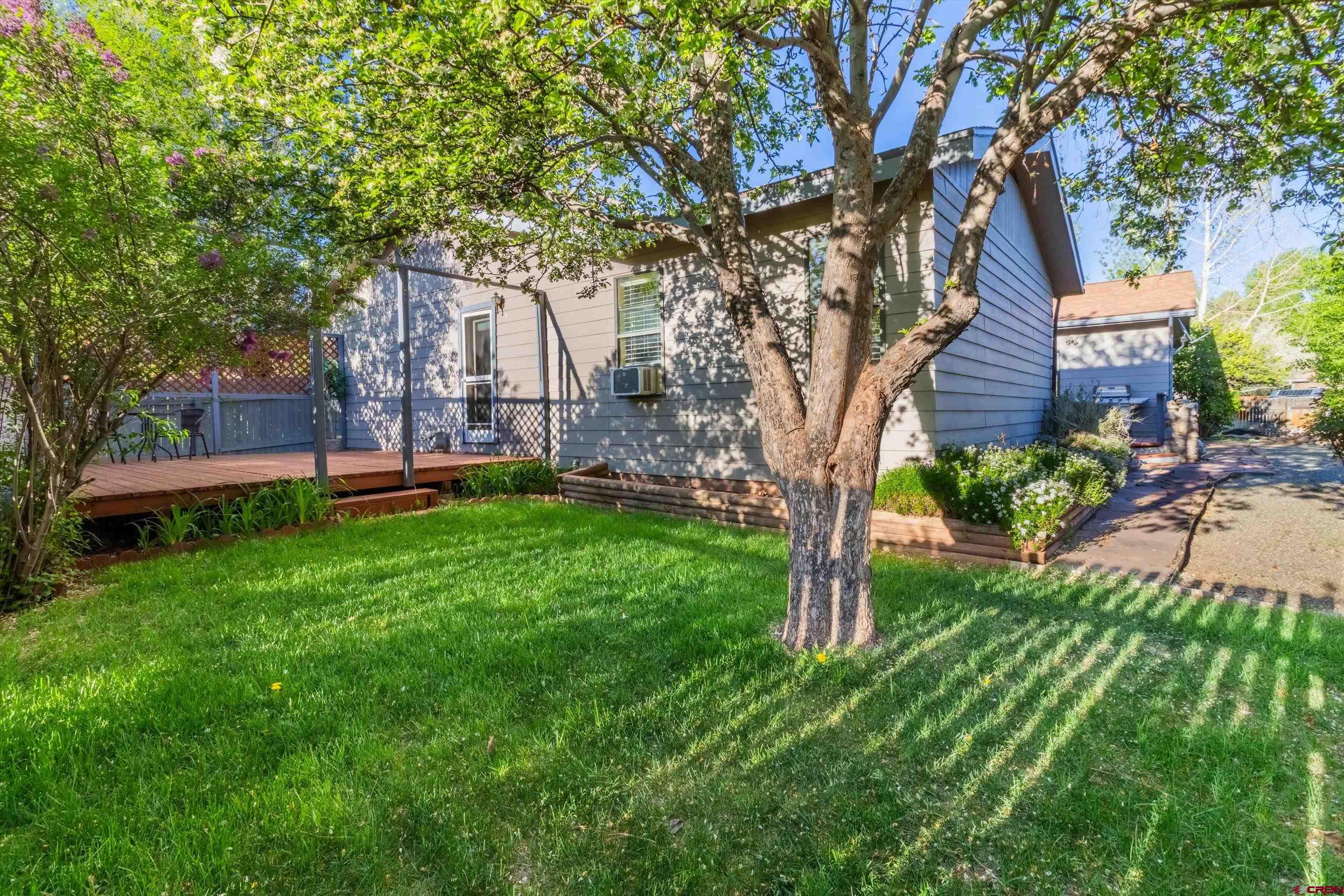 327 Hermosa Circle Durango, CO 81301 - Photo 2 of 32 a view of a house with a yard