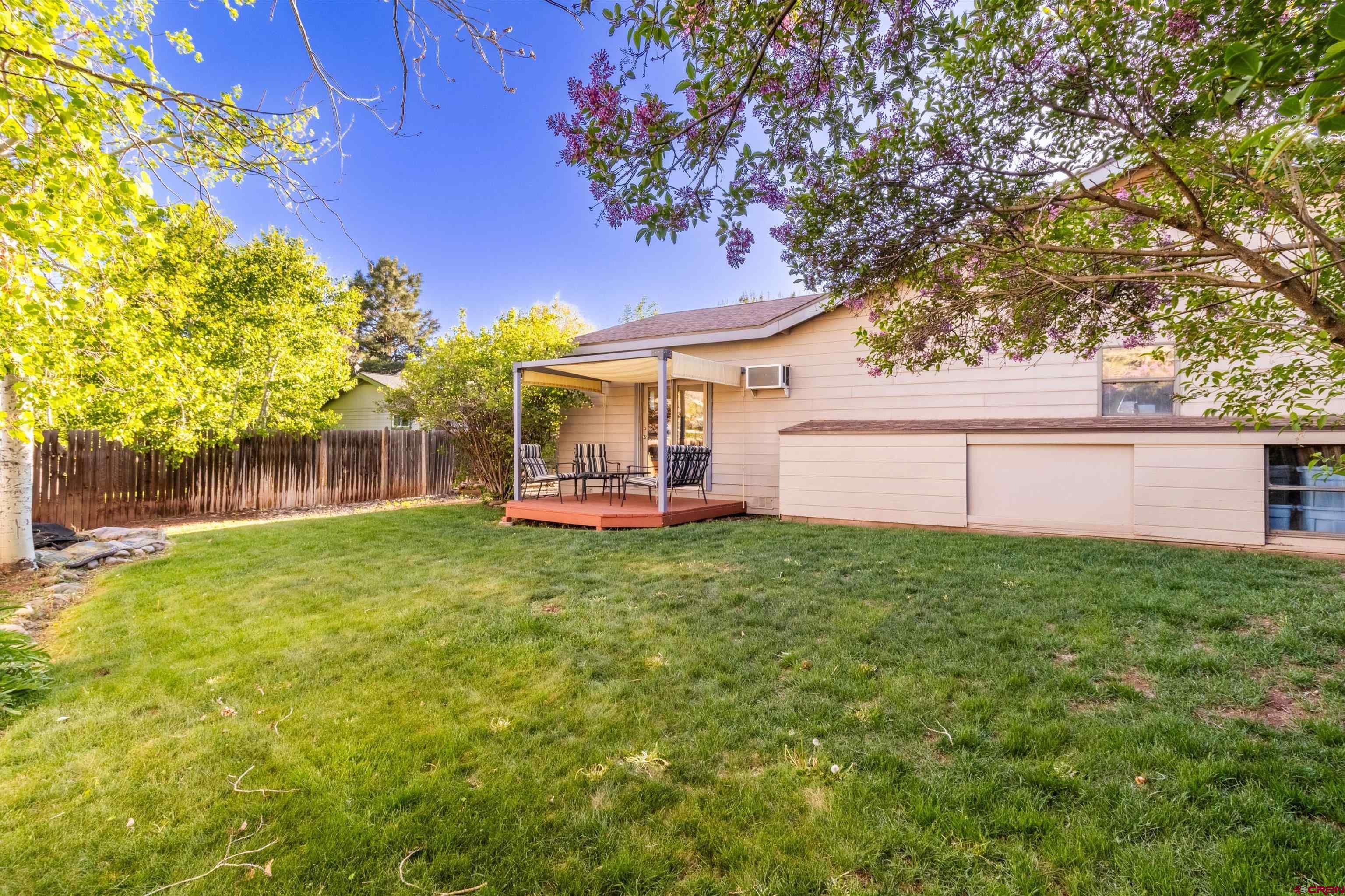 327 Hermosa Circle Durango, CO 81301 - Photo 23 of 32 a view of a house with a backyard