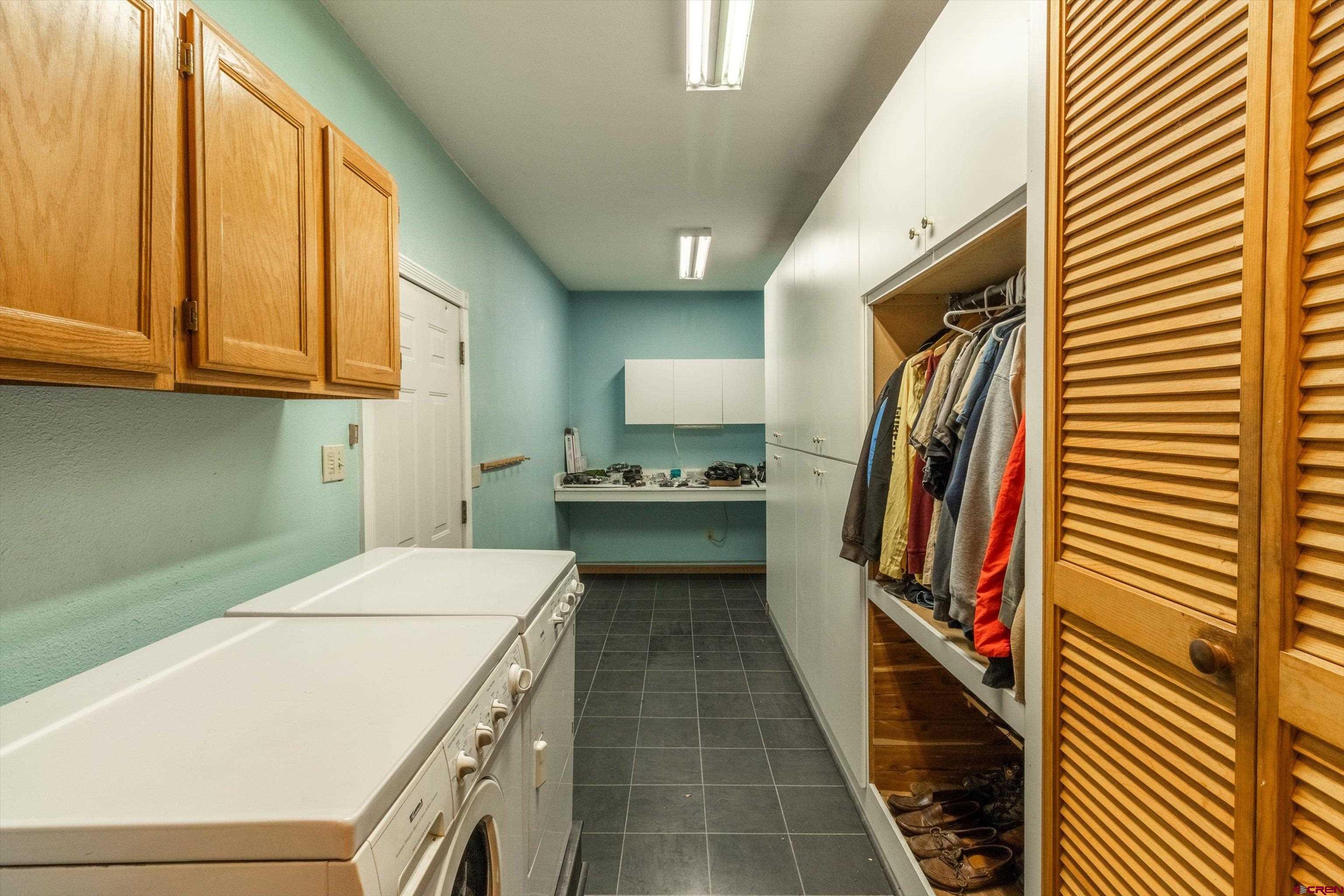 327 Hermosa Circle Durango, CO 81301 - Photo 32 of 32 a utility room with dryer and washer