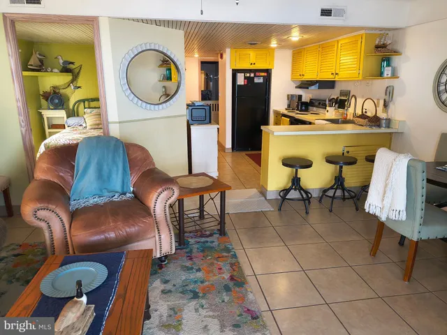 a kitchen with stainless steel appliances granite countertop a sink and a cabinets