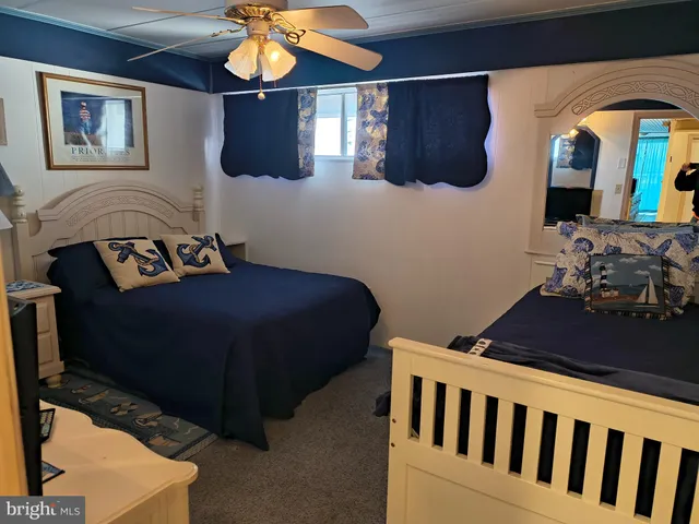 a bedroom with a bed and a cabinets