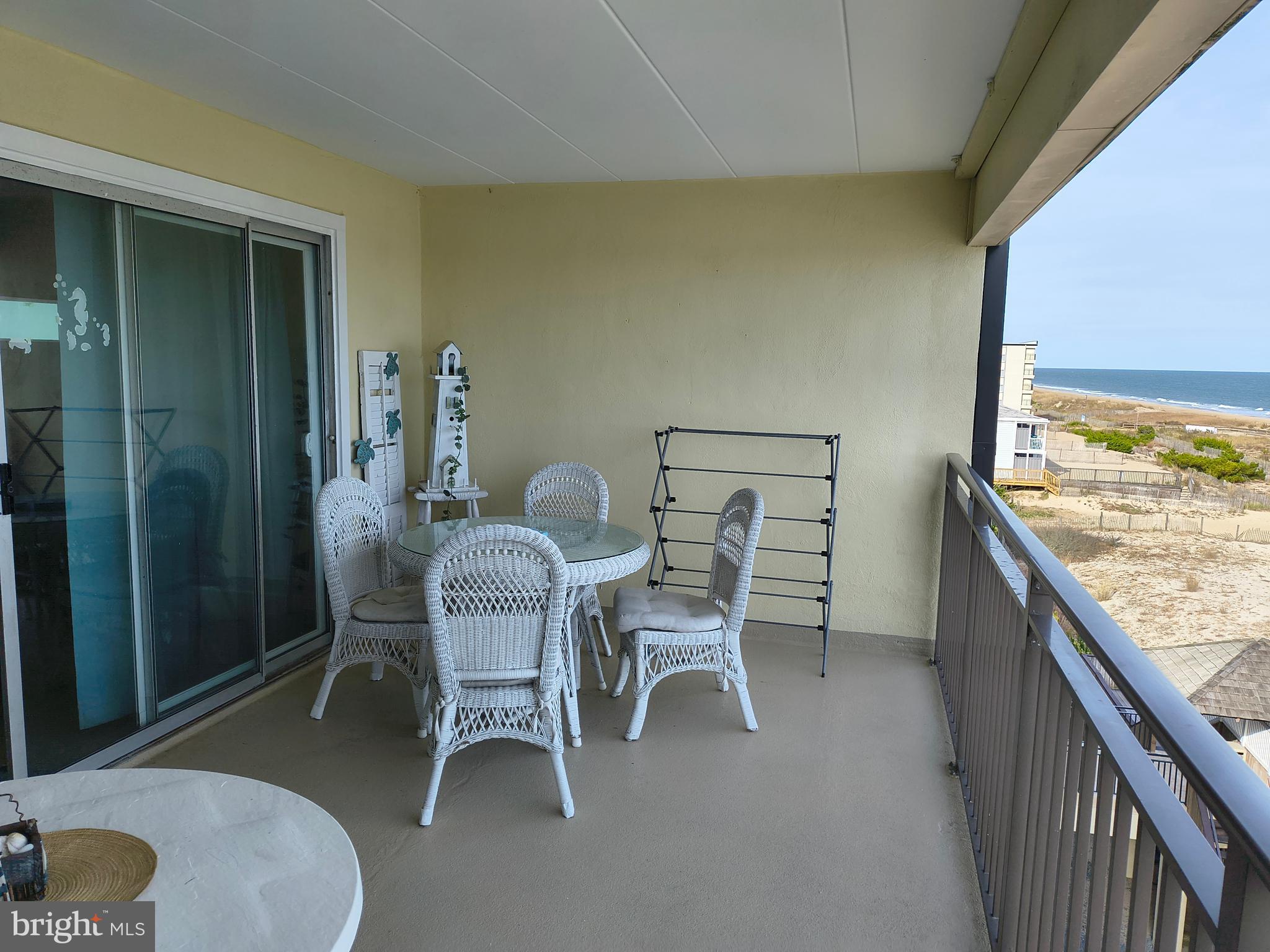 6803 Atlantic Avenue, Unit 4L Ocean City, MD 21842 - Photo 27 of 34 a dining room with furniture and wooden floor