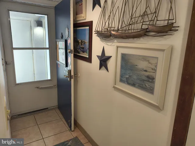 a kitchen with a sink a stove and cabinets