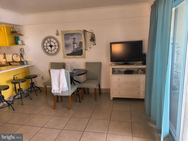 a kitchen with stainless steel appliances granite countertop a sink and a cabinets
