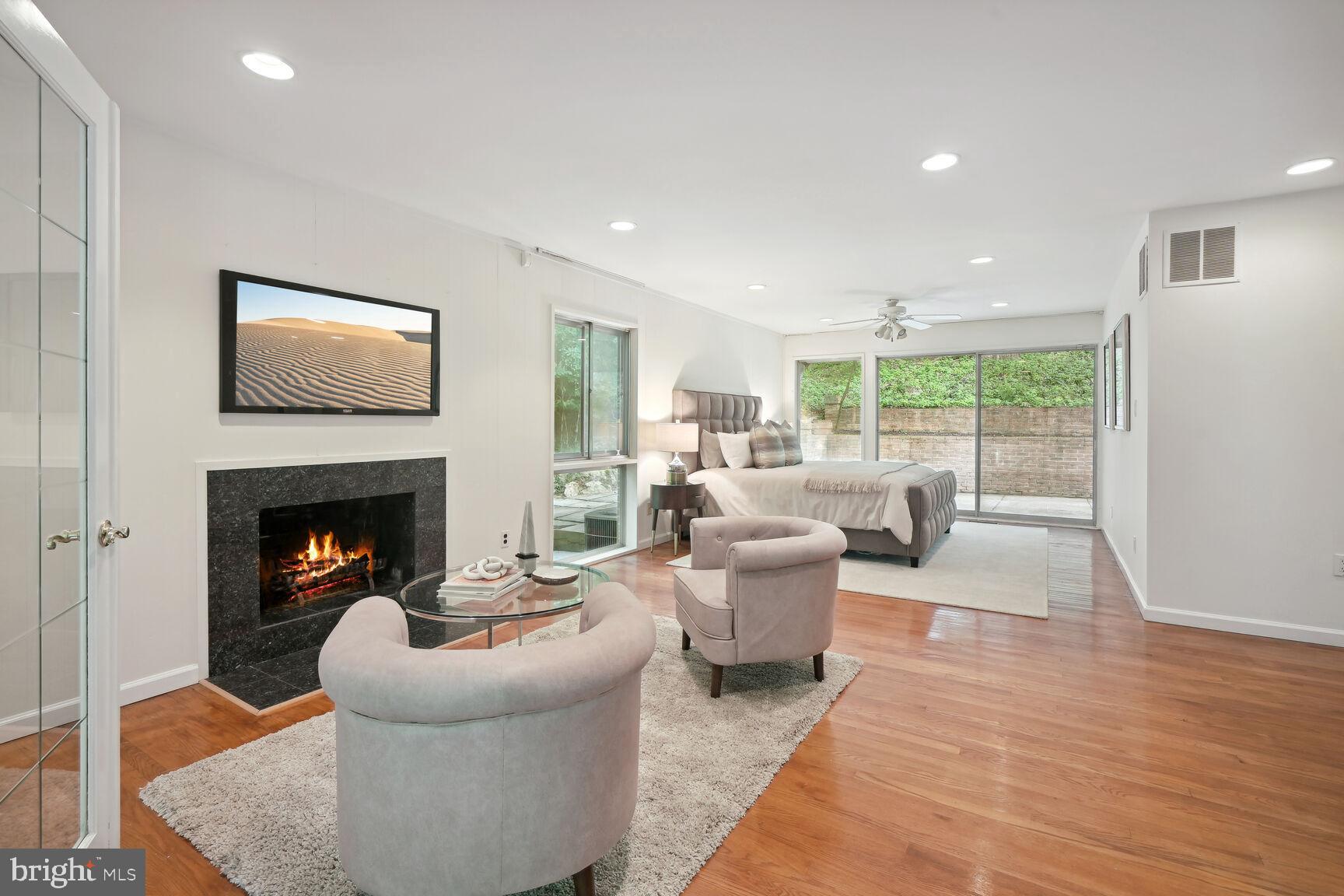 7204 Selkirk Drive Bethesda, MD 20817 - Photo 27 of 49 Primary Suite with Fireplace