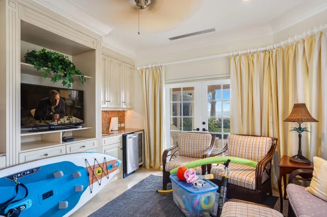 an aerial view of multiple houses with yard