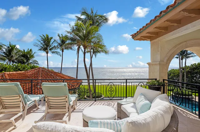 an aerial view of a house with a garden