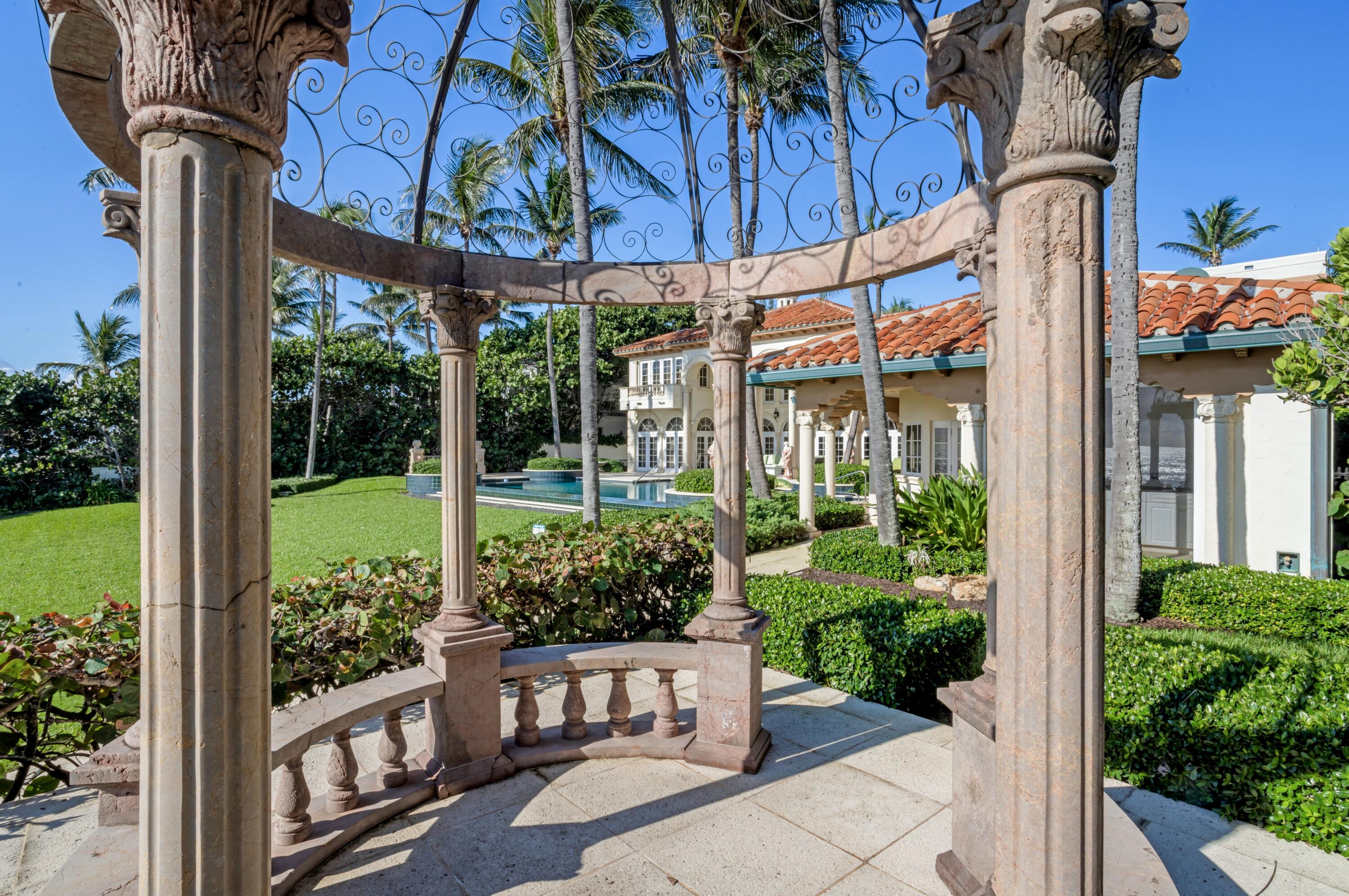 6133 North Ocean Boulevard Ocean Ridge, FL 33435 - Photo 49 of 64 a view of a porch with sitting area