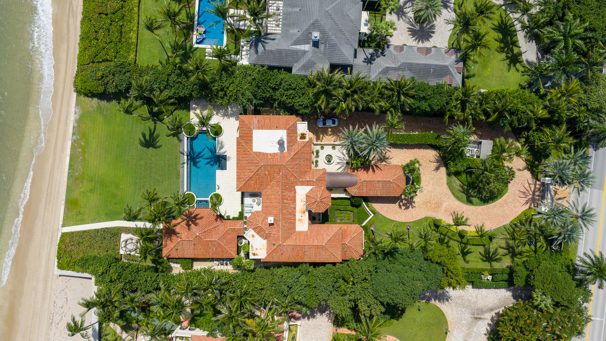 6133 North Ocean Boulevard Ocean Ridge, FL 33435 - Photo 59 of 64 an aerial view of a house with outdoor space pool seating area and yard