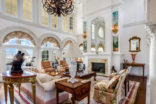 a view of a dining room with furniture window and chandelier
