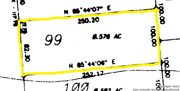 a view of swimming pool with chairs