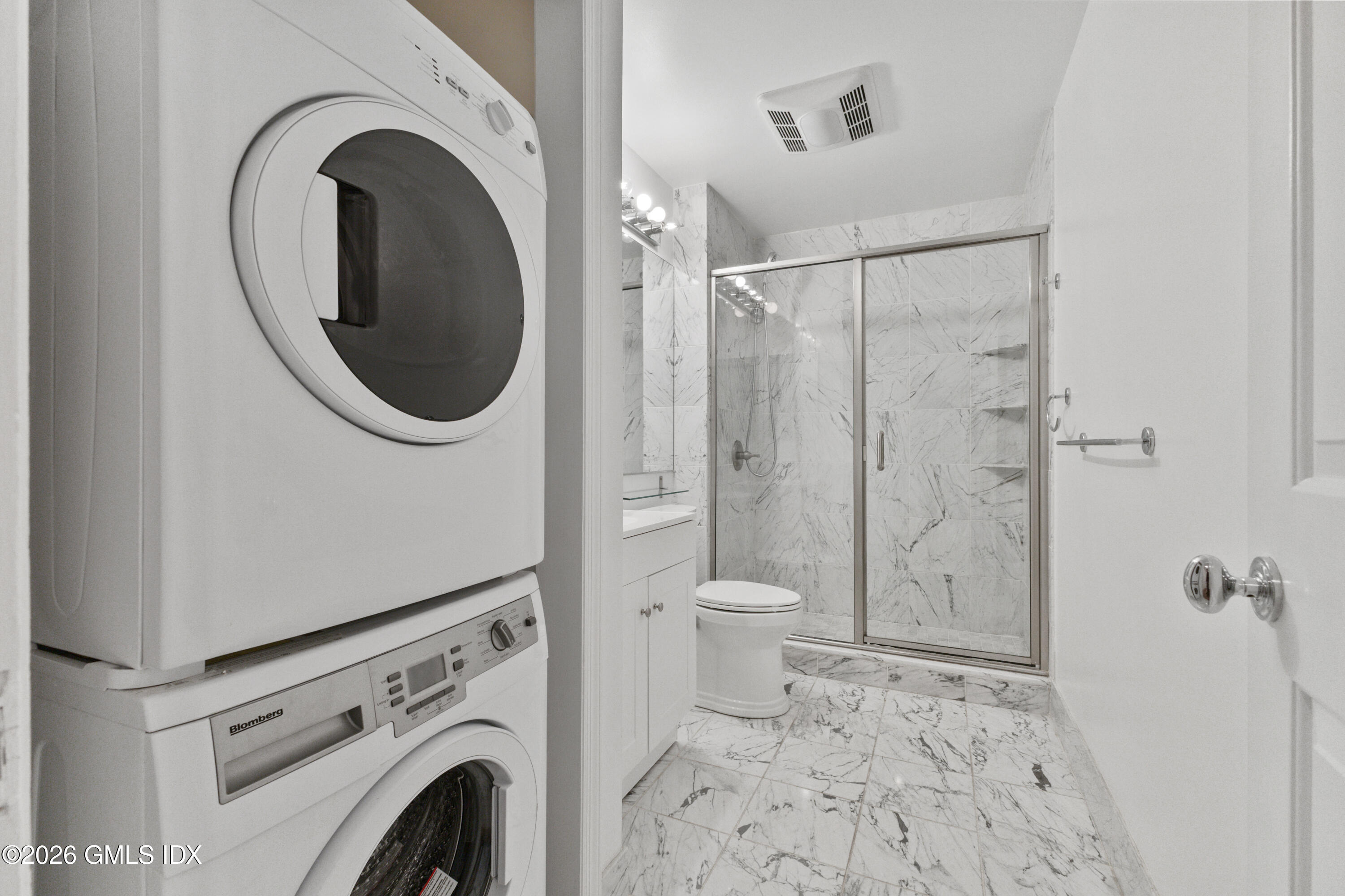 15 River Road, Unit 210 Cos Cob, CT 06807 - Photo 10 of 23 a bathroom with a toilet and a sink