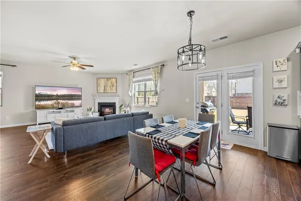 a kitchen with kitchen island granite countertop a center island stainless steel appliances cabinets and a center island