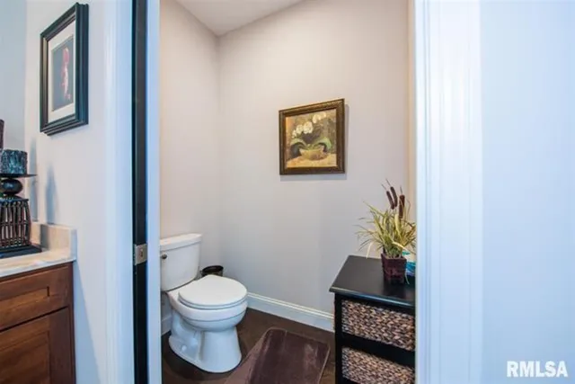 a bathroom with a shower and a sink