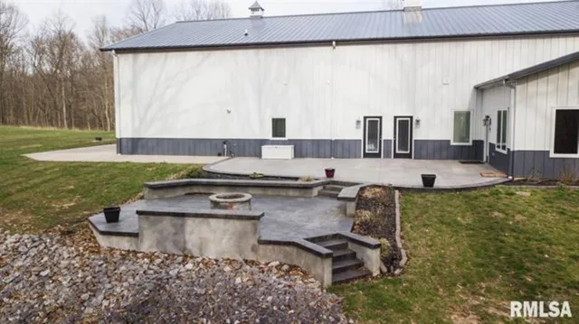 a view of a backyard with tree