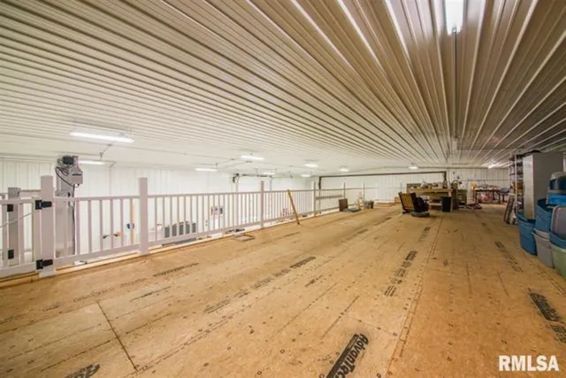 a view of a yard with a large tree