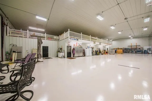 a view of a swimming pool with an outdoor space and seating area