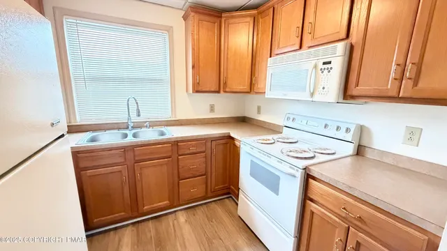 a bathroom with a toilet and a shower curtain