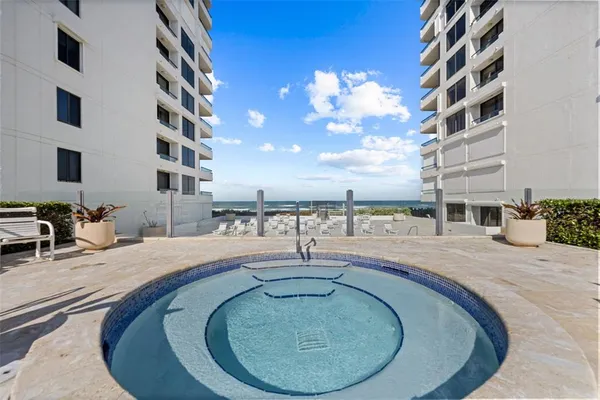 a view of a terrace with a big yard