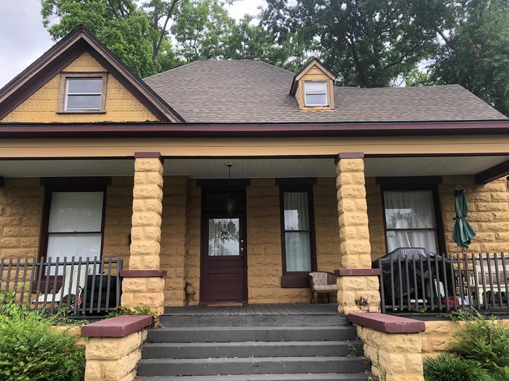 1345 18th Street Columbus, GA 31901 - Photo 2 of 16 a front view of a house with a yard