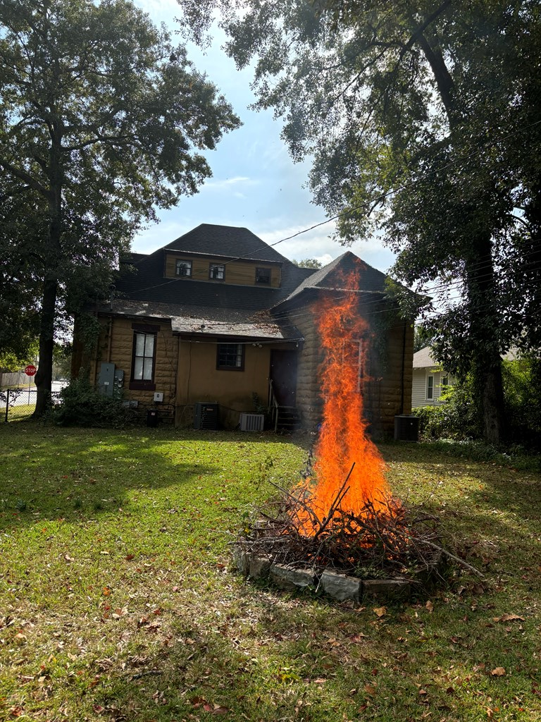 1345 18th Street Columbus, GA 31901 - Photo 3 of 16 a front view of a house with a yard
