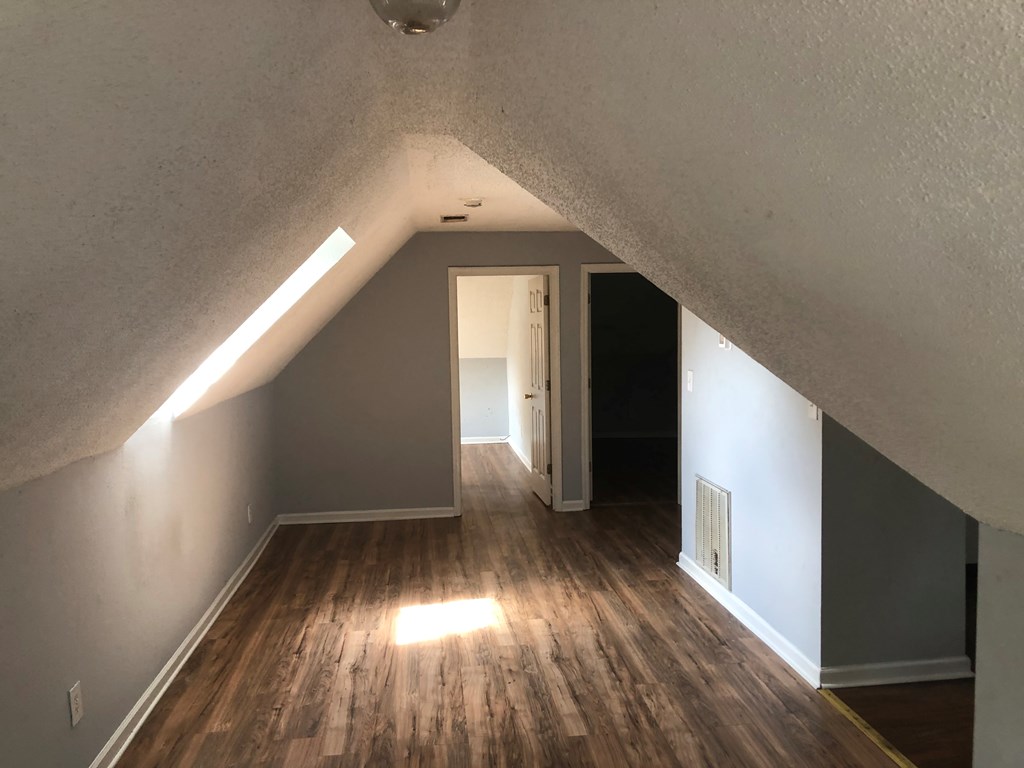 1345 18th Street Columbus, GA 31901 - Photo 10 of 16 a view of gallery with wooden floor