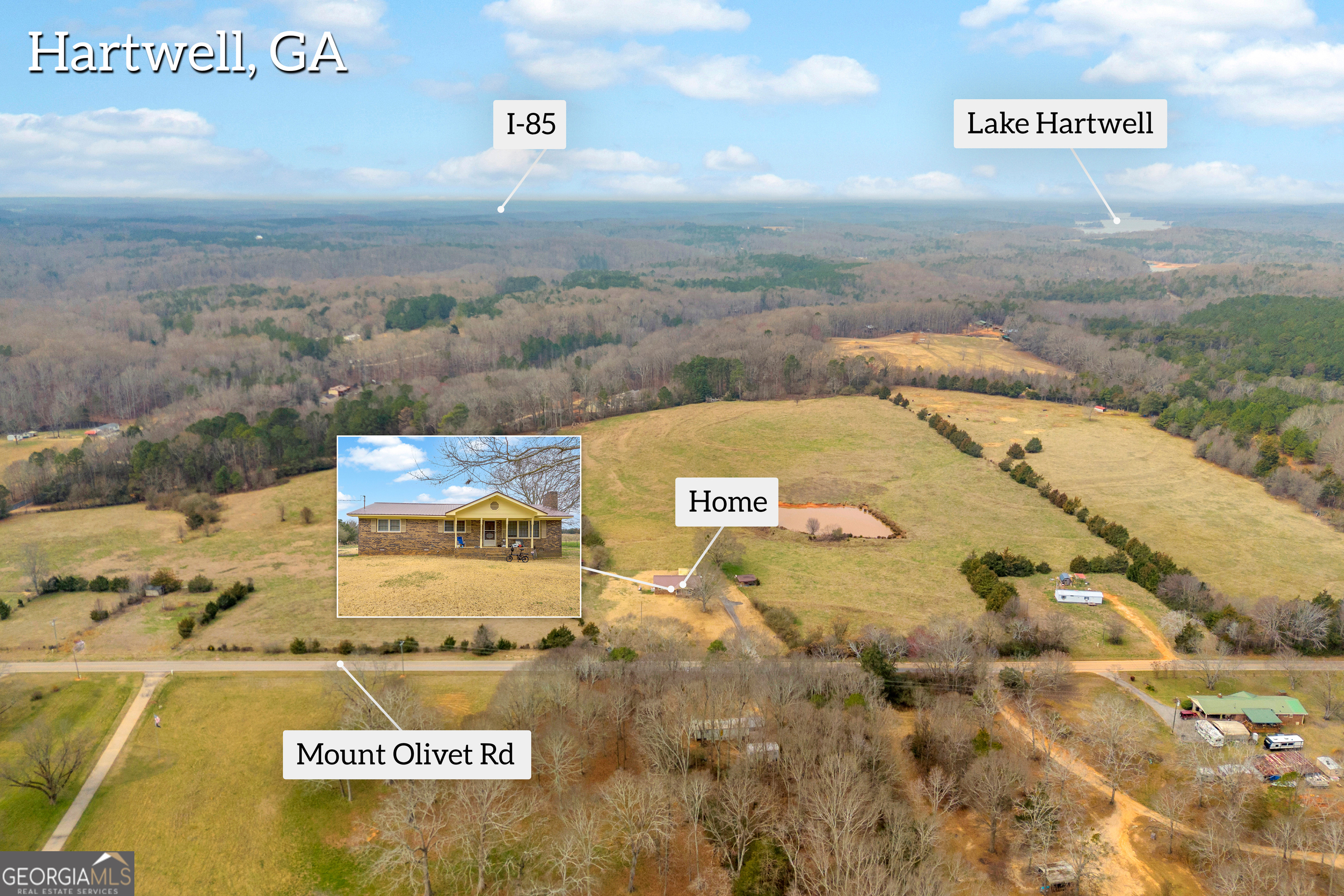 7743 Mt Olivet Road Hartwell, GA 30643 - Photo 7 of 42 a view of residential houses with outdoor space