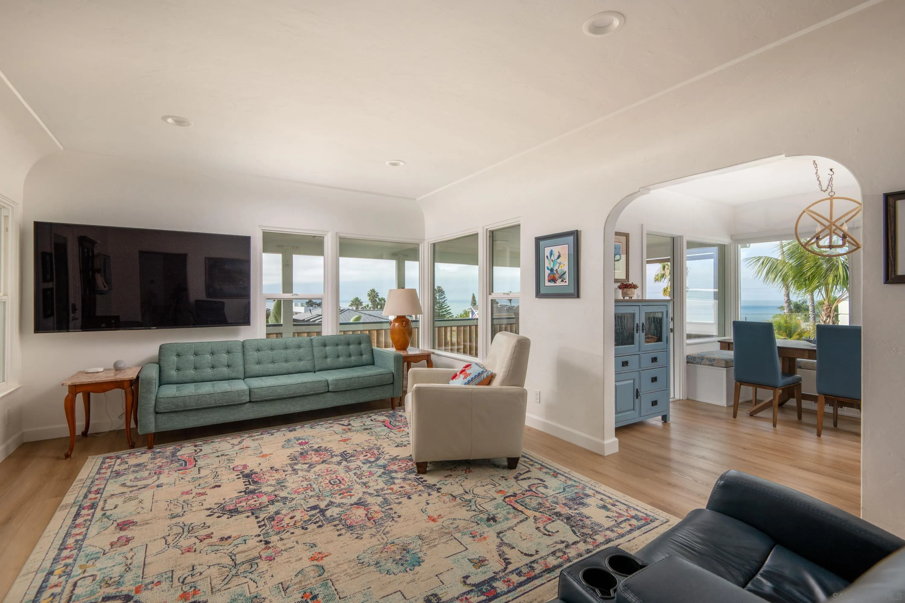 4484 Orchard Avenue San Diego, CA 92107 - Photo 11 of 36 a living room with furniture and a couch