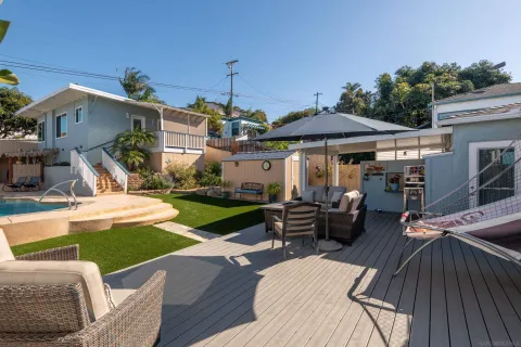a view of yard with patio