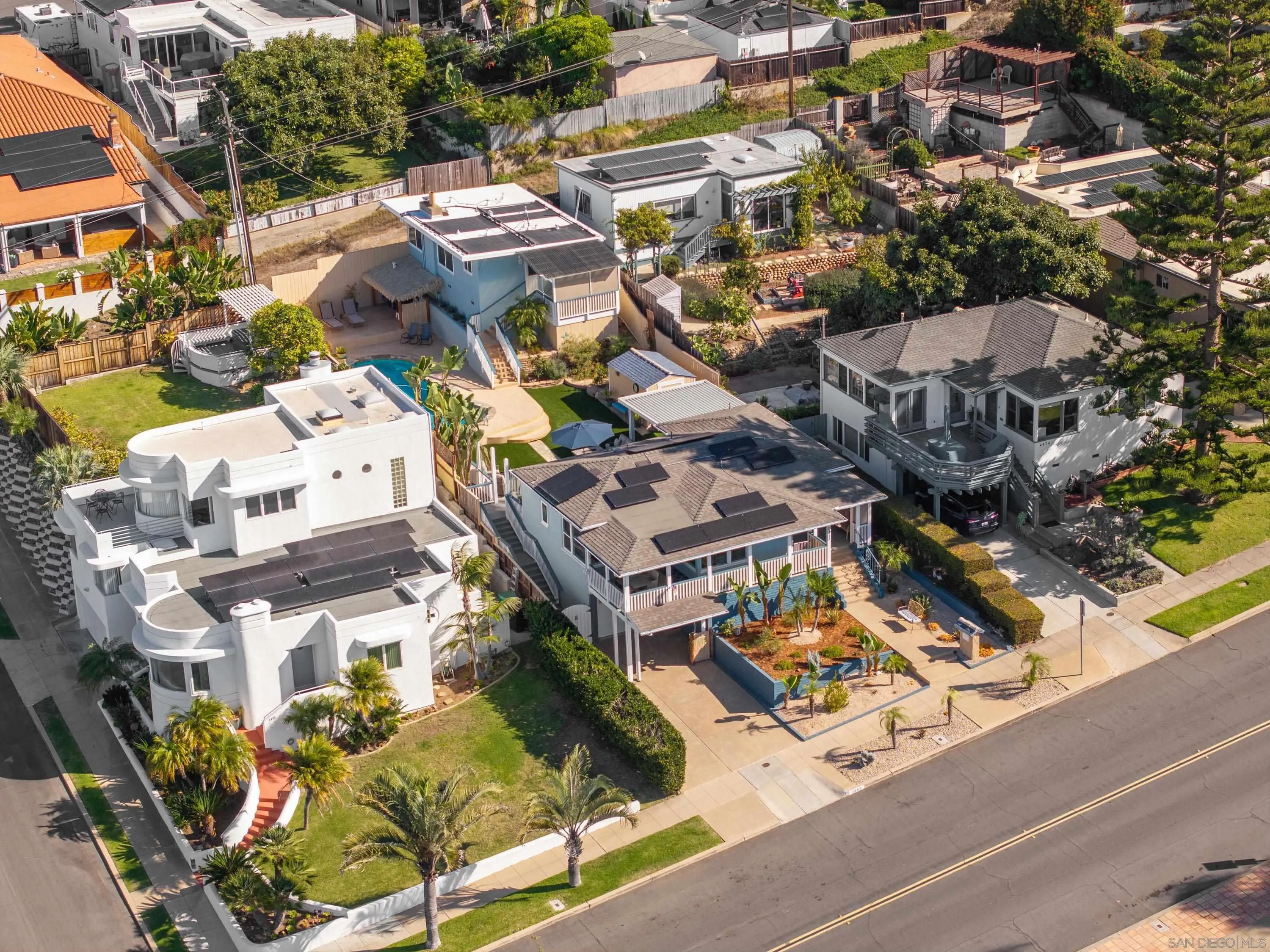 4484 Orchard Avenue San Diego, CA 92107 - Photo 2 of 36 an aerial view of residential houses with outdoor space