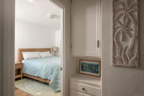 a bathroom with a toilet a sink and shower