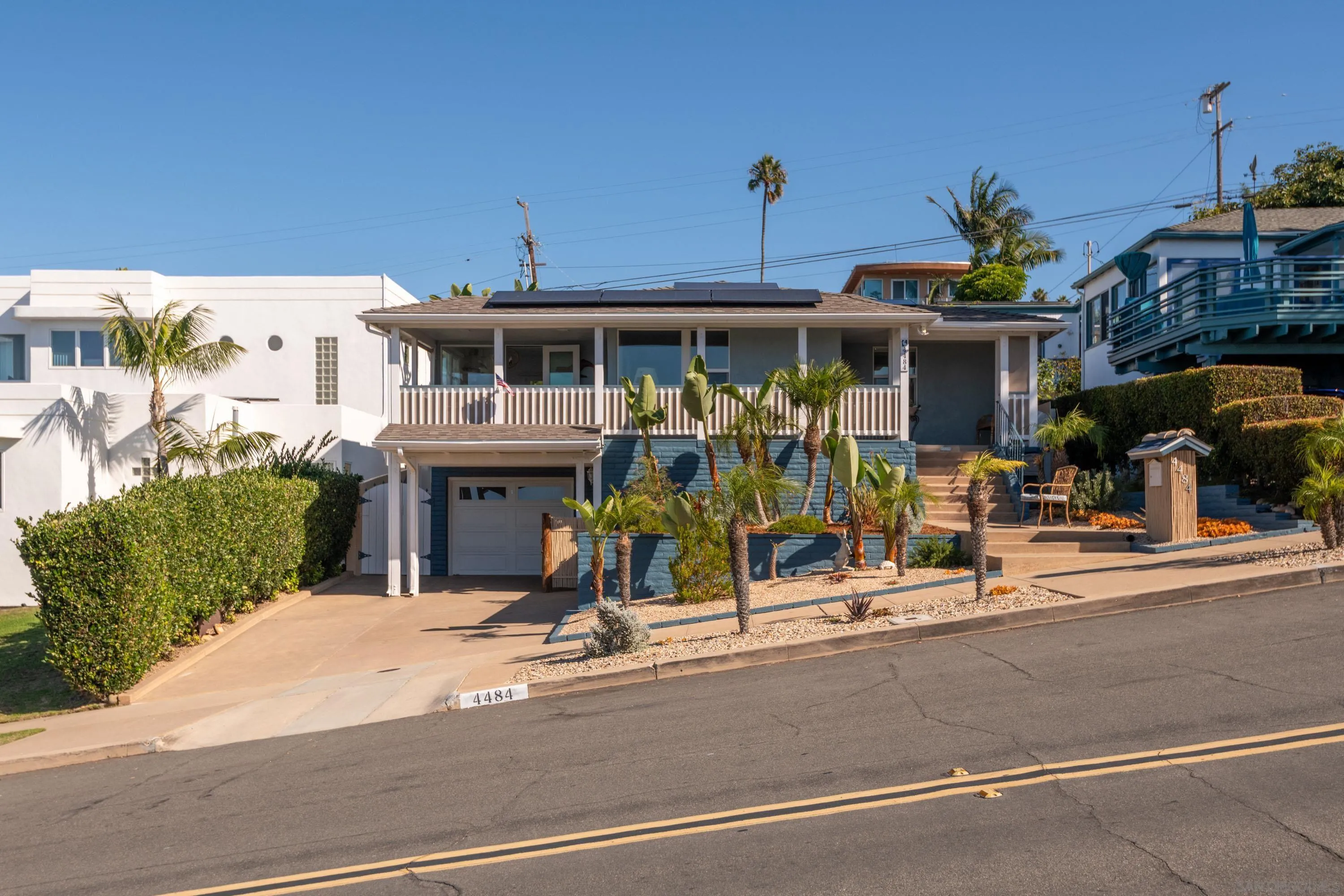 4484 Orchard Avenue San Diego, CA 92107 - Photo 4 of 36 a view of a house with sitting area