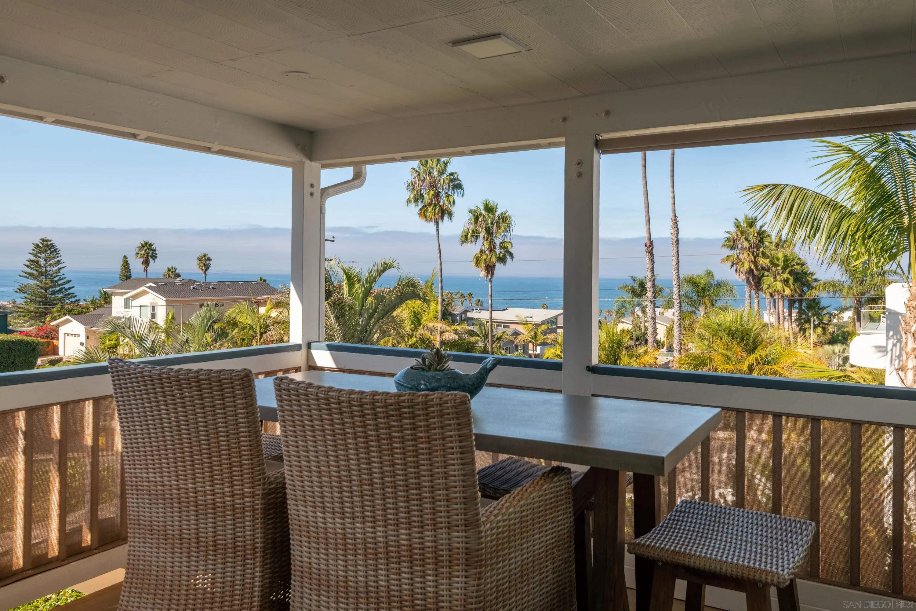 4484 Orchard Avenue San Diego, CA 92107 - Photo 7 of 36 a view of a tables and chair and potted plants with wooden floor