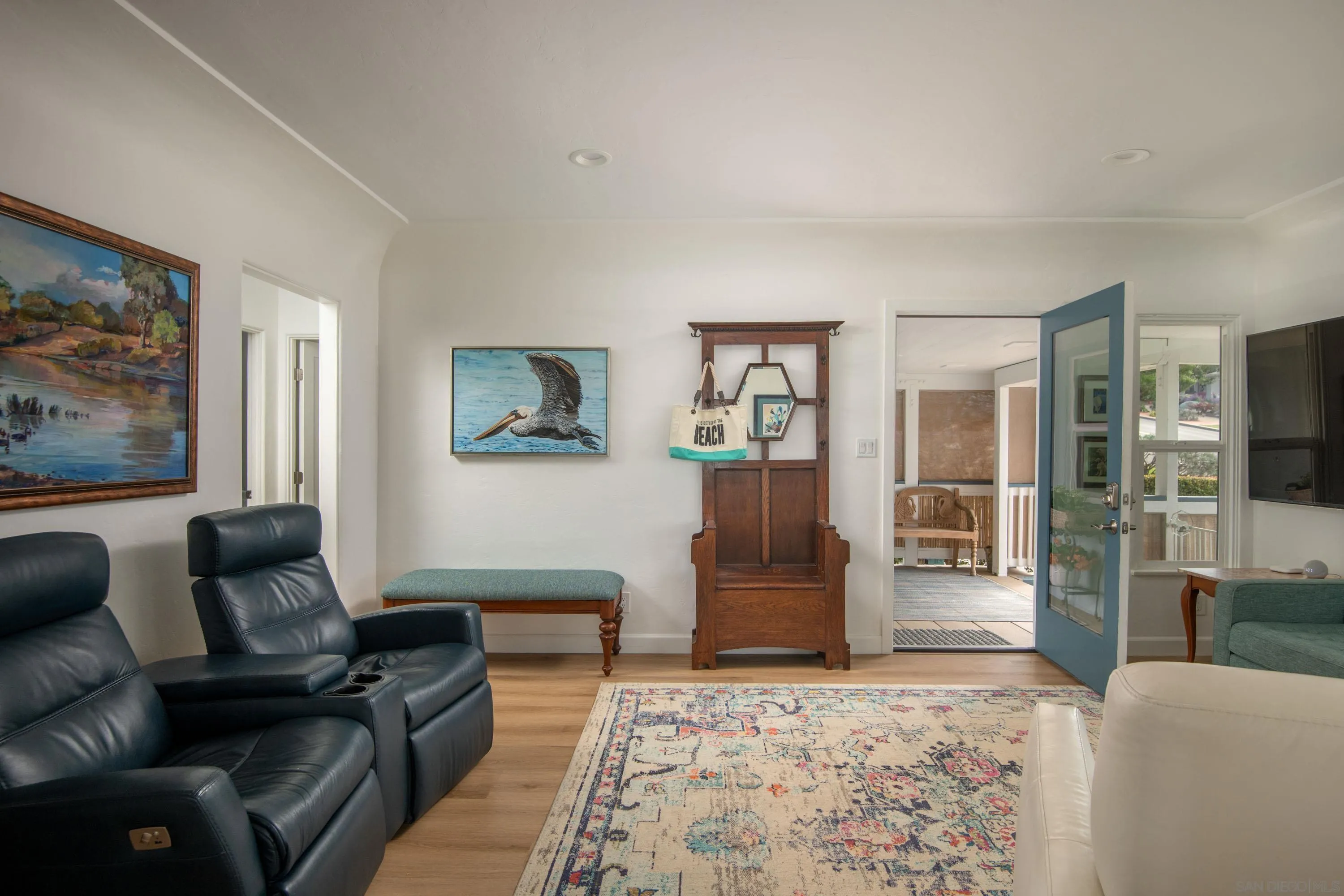 4484 Orchard Avenue San Diego, CA 92107 - Photo 10 of 36 a living room with furniture and a couch