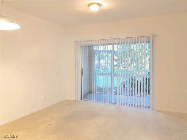 a view of a room with a large window