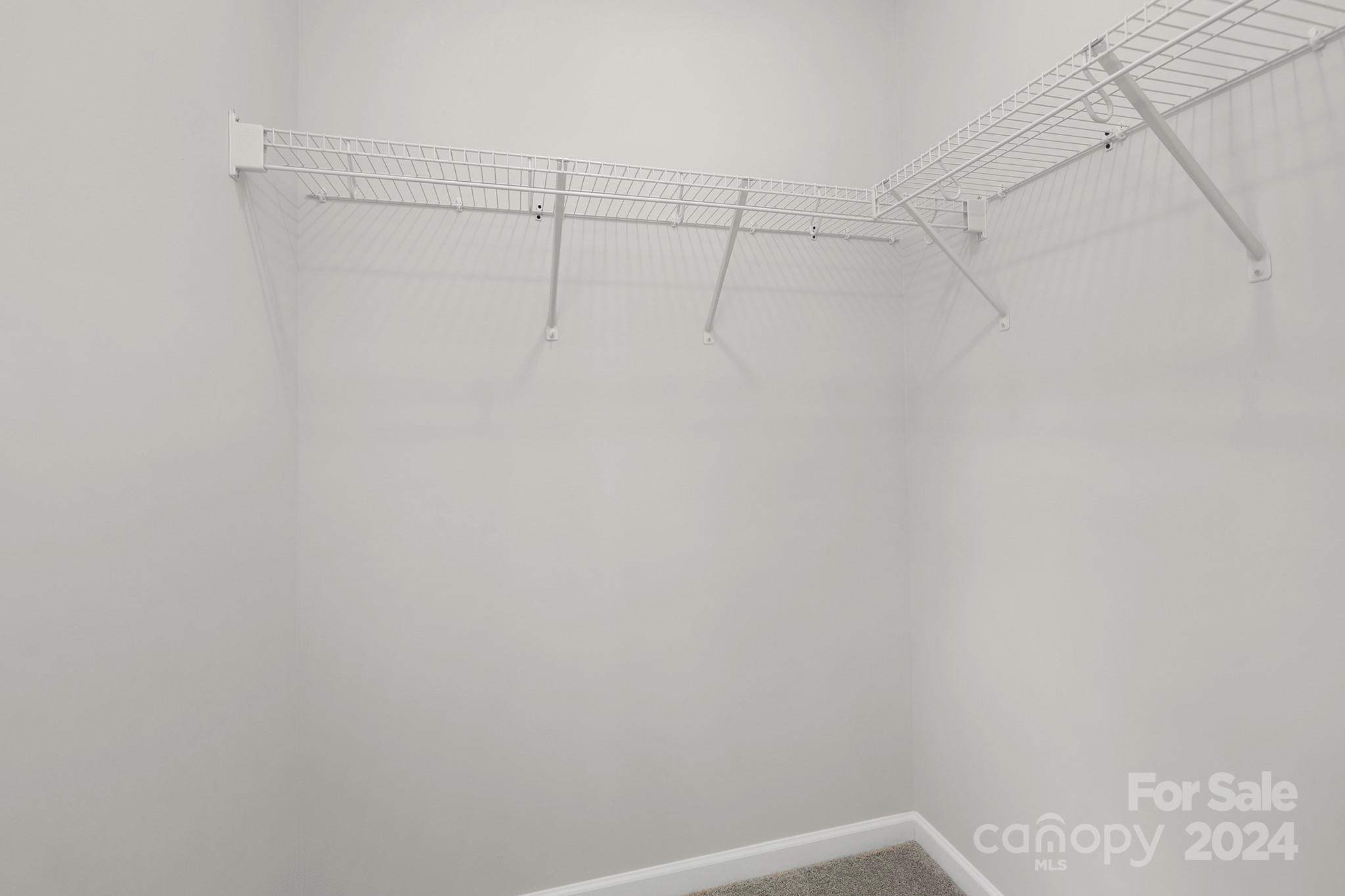 310 Morningside Road Charlotte, NC 28214 - Photo 19 of 23 a view of a room with racks on the wall
