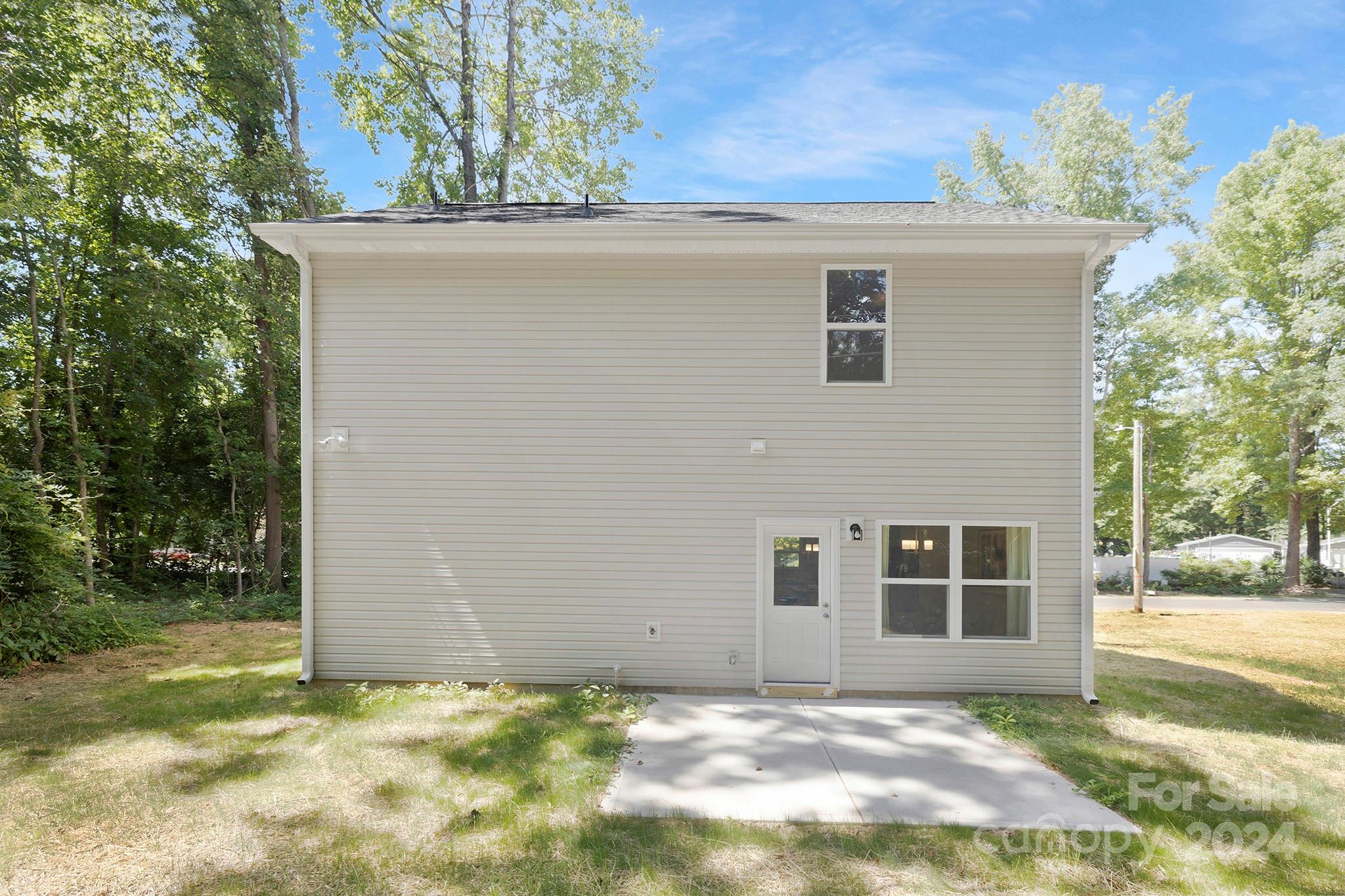 310 Morningside Road Charlotte, NC 28214 - Photo 20 of 23 a view of a house with a yard
