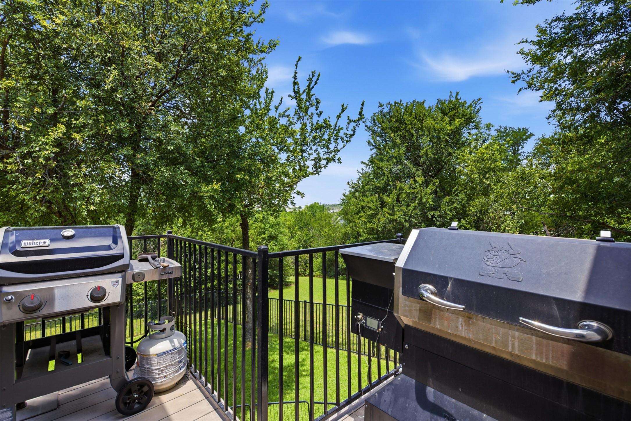 1804 Tanner Loop Taylor, TX 76574 - Photo 39 of 40 You'll enjoy views of tree-dotted acreage while grilling.