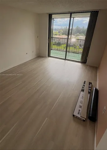 a view of a room with rack on the wall