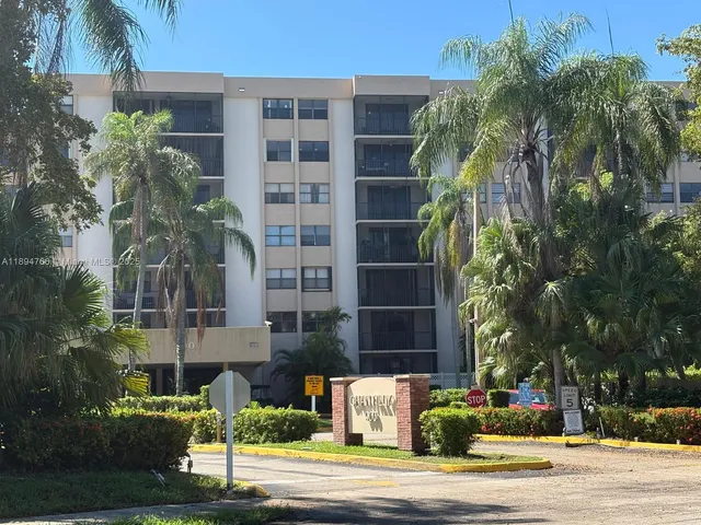 a view of a sink and dishwasher in a kitchen
