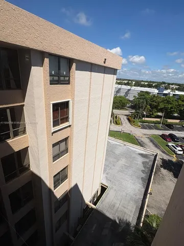 a car parked in front of a building