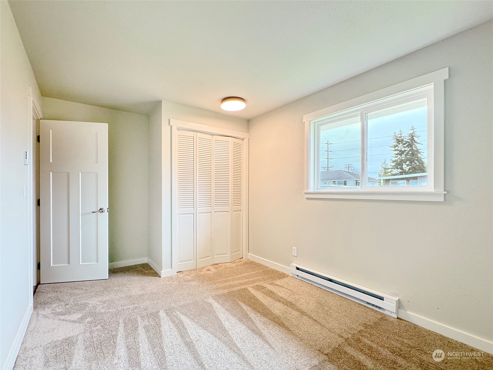 218 North Matriotti Avenue Sequim, WA 98382 - Photo 22 of 40 a view of an empty room with a window