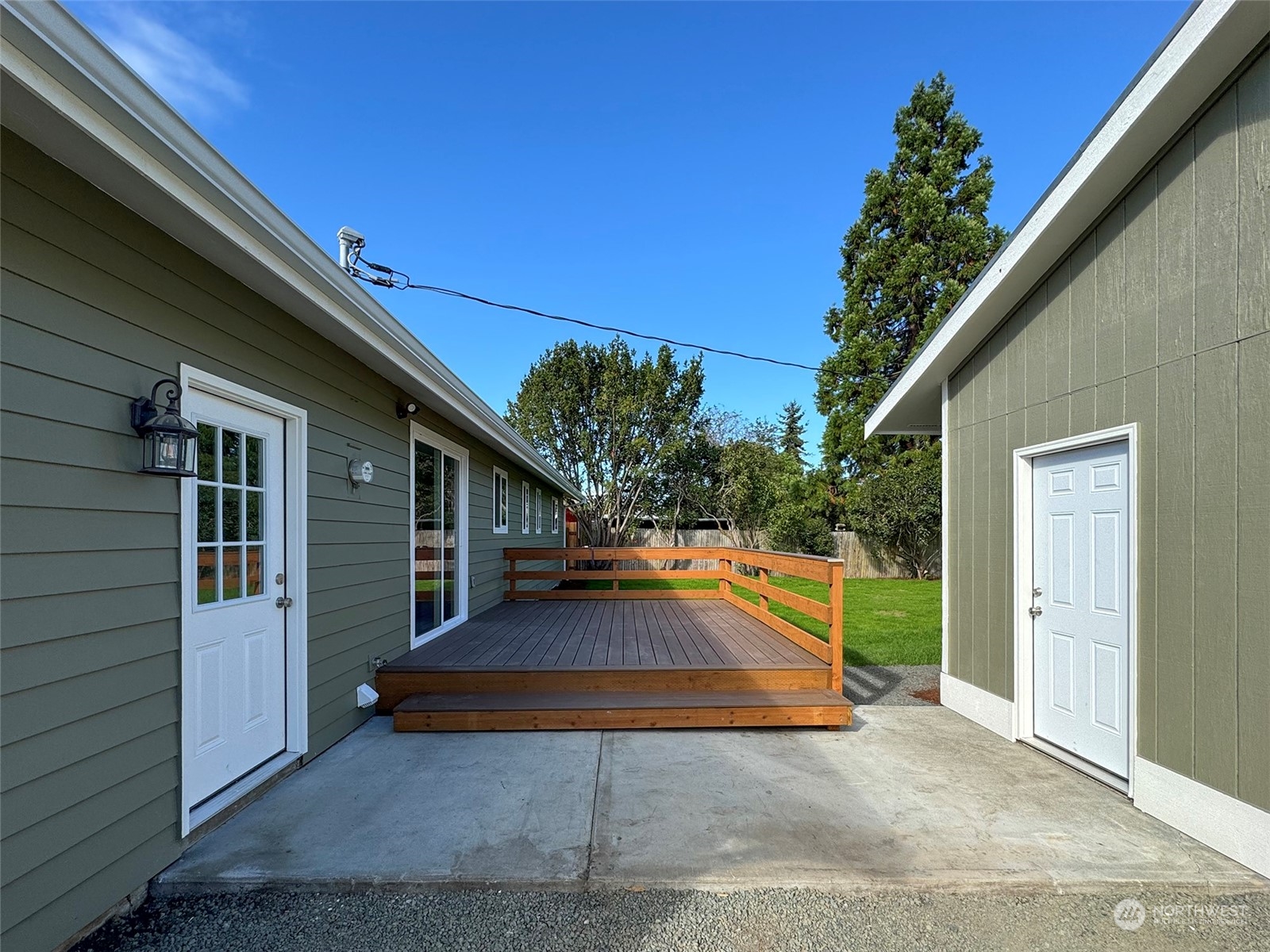 218 North Matriotti Avenue Sequim, WA 98382 - Photo 30 of 40 a view of backyard with swimming pool and outdoor seating