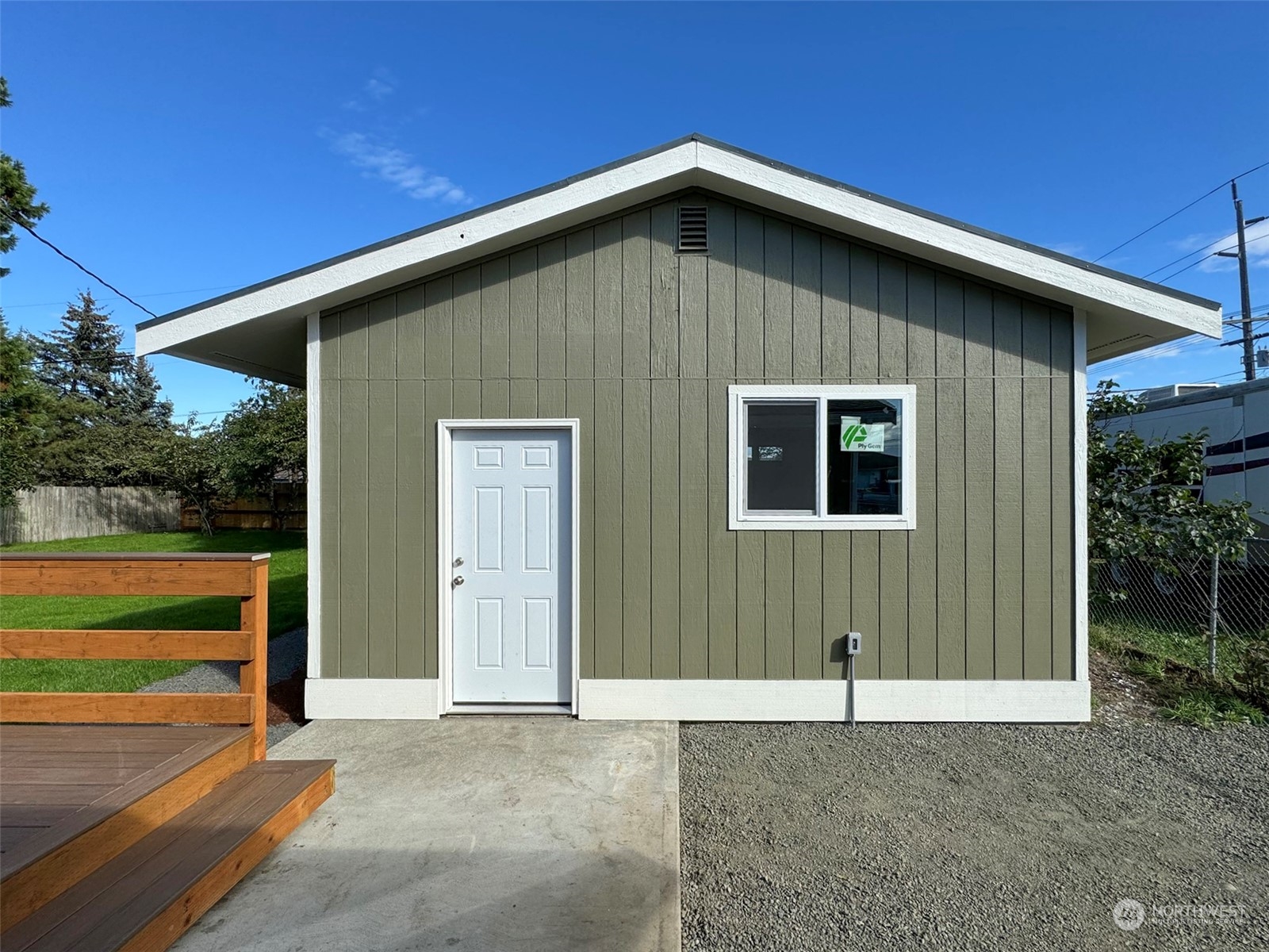 218 North Matriotti Avenue Sequim, WA 98382 - Photo 34 of 40 a front view of a house with a yard