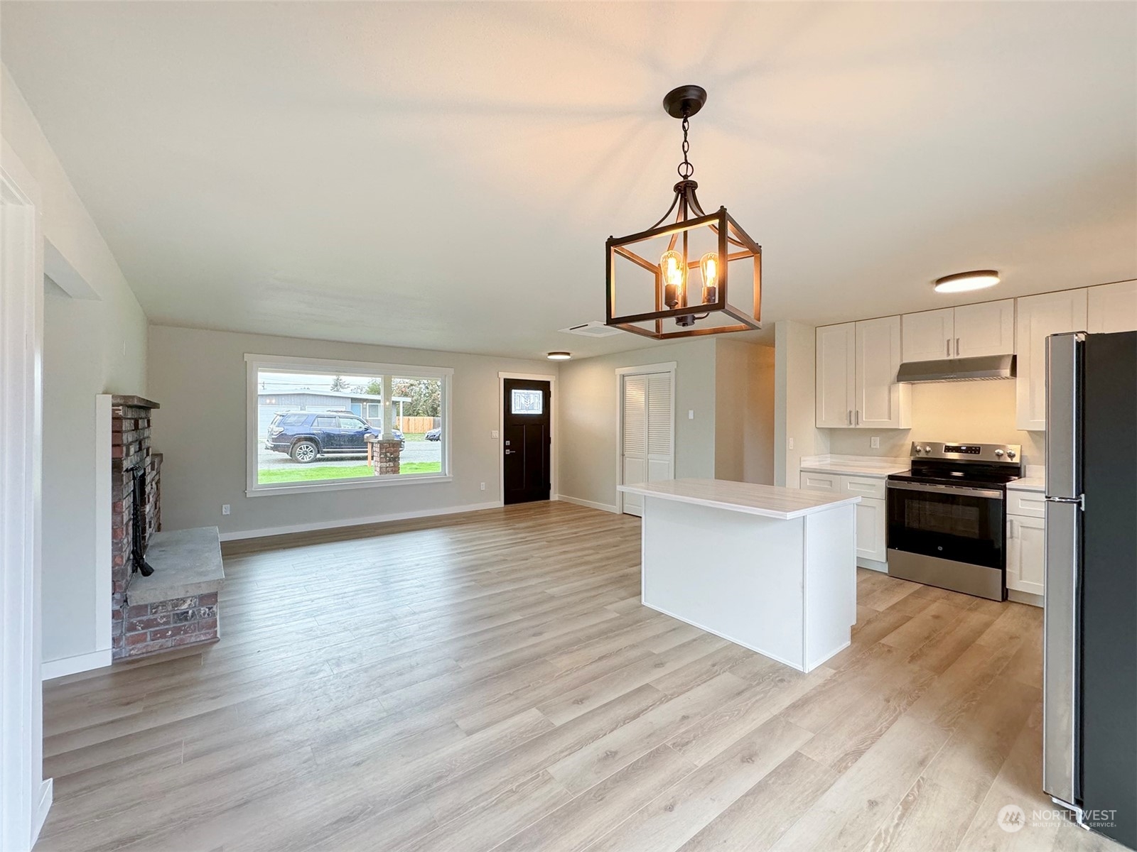 218 North Matriotti Avenue Sequim, WA 98382 - Photo 8 of 40 a view of a kitchen from the hallway