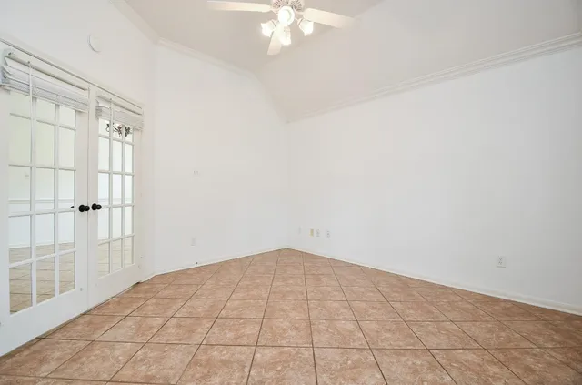 en empty room with windows