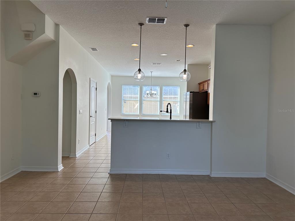 7668 Billingham Street Windermere, FL 34786 - Photo 4 of 15 a view of a kitchen with a sink and cabinets