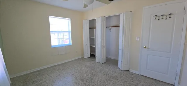 a view of backyard with roof deck