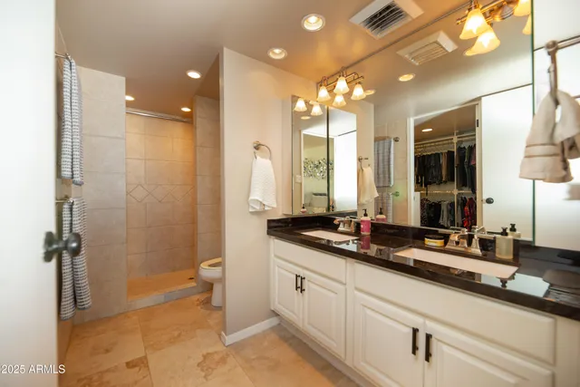 a view of a hallway view with wooden floor and staircase